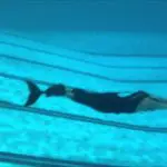 Swimmer in Pool Using Opti Fins