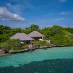 Tropical Overwater Bungalows with Clear Water