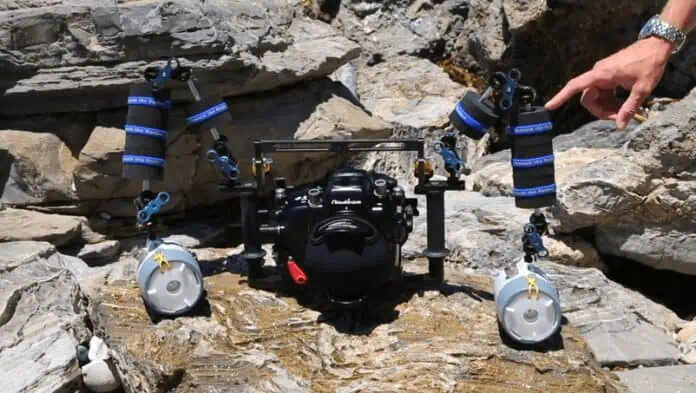 Opti underwater camera float system for secure filming.