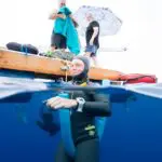 Deep-sea diver preparing for underwater exploration