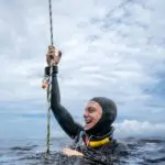 Deep Blue diver celebrating success in open water