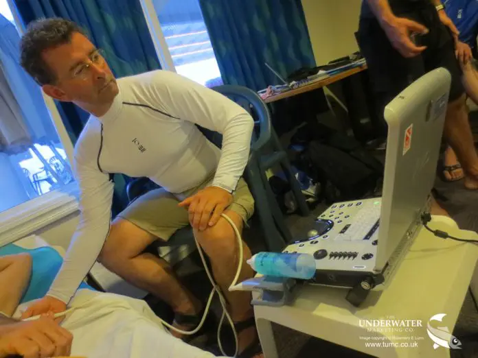 Diving research physiologist Dr Neal Pollock conducting decompression research in the field