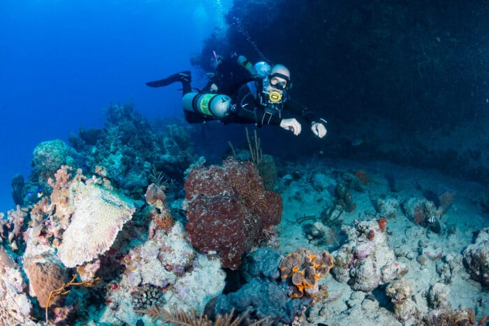 Technical Diving - Scuba Diver in Sidemount with Mixed Gas