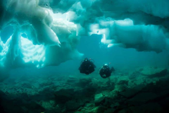 Fast river and Alpine lake ice diving