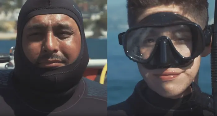 Retired USMC Sgt. Juan Gonzales diving with his son Marcus
