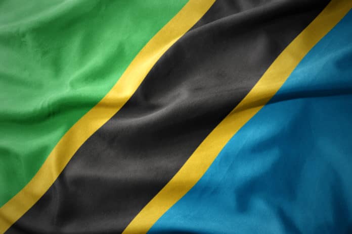 Waving colorful flag of Tanzania.