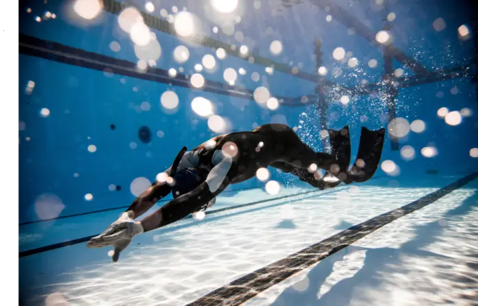 Freediver Performing during a DYN Freediving Competition