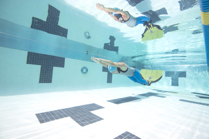 Claire in swimming form (photo by Bill Lamp'l)