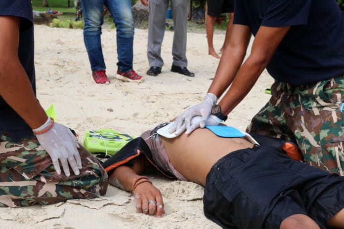 CPR and AED on the beach ,Training Automated External Defibrillator for Rescue and first aid in Thailand.