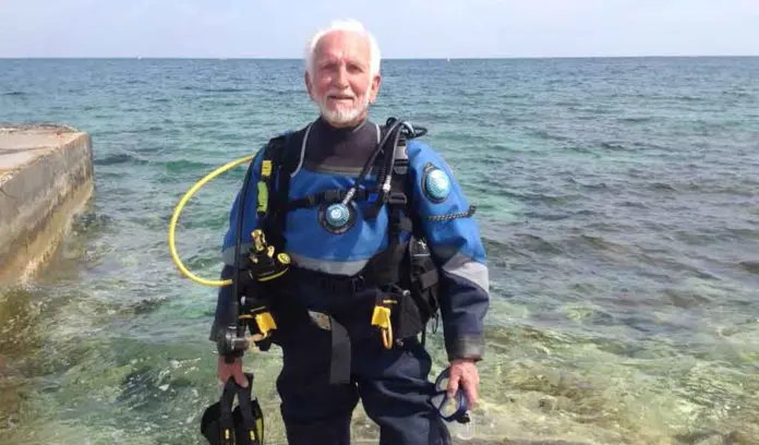 Ray Woolley preparing to dive