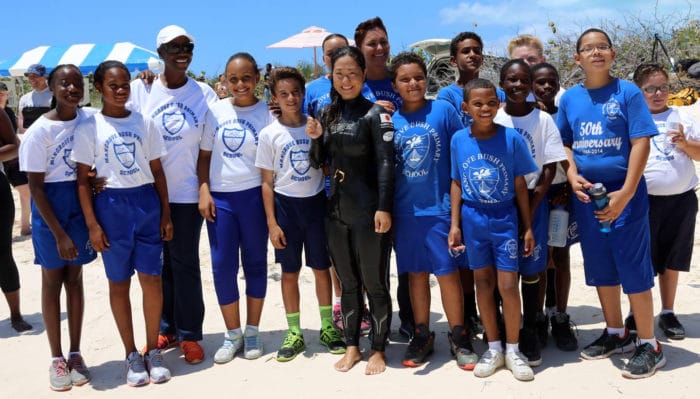 Sayuri and the local school kids (photo courtesy of Howard Holtzman)