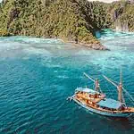 Deep Blue Sailing Ship in Tropical Waters