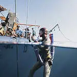 Deep-sea diver preparing for underwater exploration
