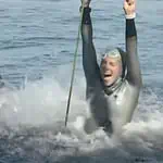 Swimmer Celebrating in Open Water
