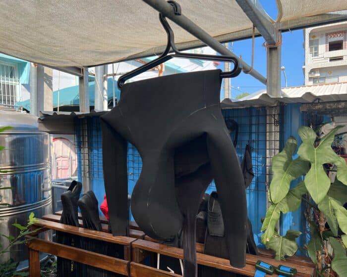 Hang your wetsuit to dry properly after every in-water session–in the shade and in a well-ventilated area.
