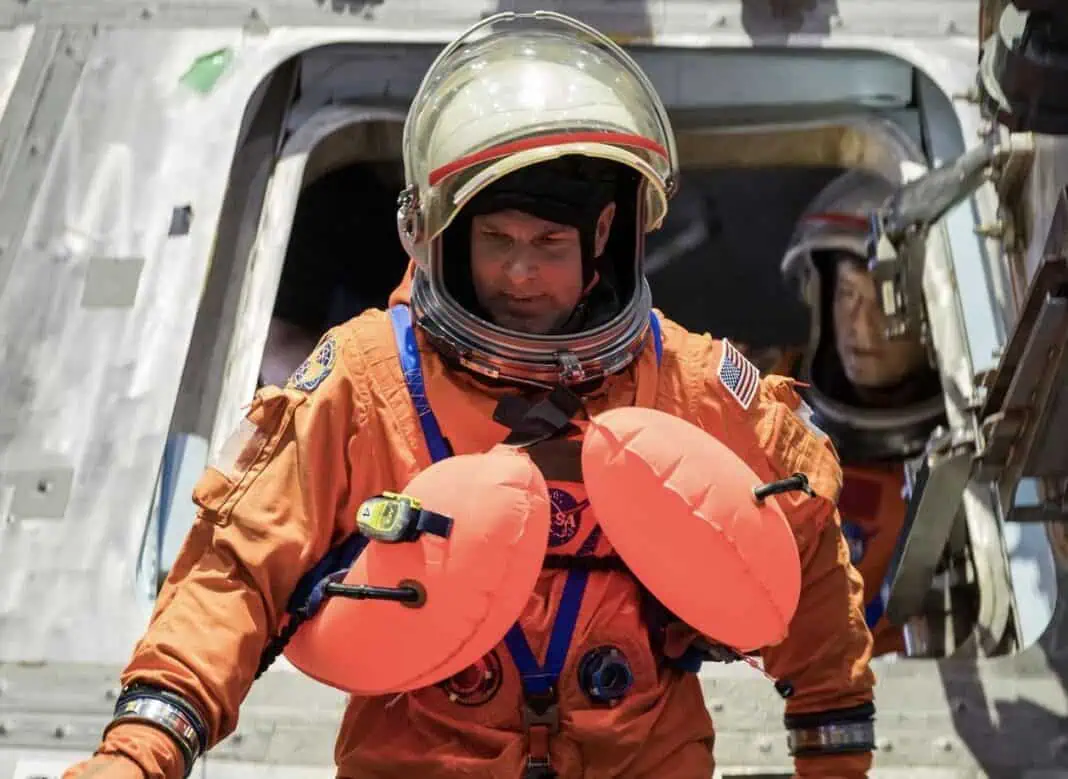 Artemis II crew member and Canadian Space Agency astronaut Jeremy Hansen exits a mockup of the Orion spacecraft during a training exercise in the Neutral Buoyance Lab at NASA’s Johnson Space Center in Houston, January 23. (Image credit: Omni Measurement Systems)